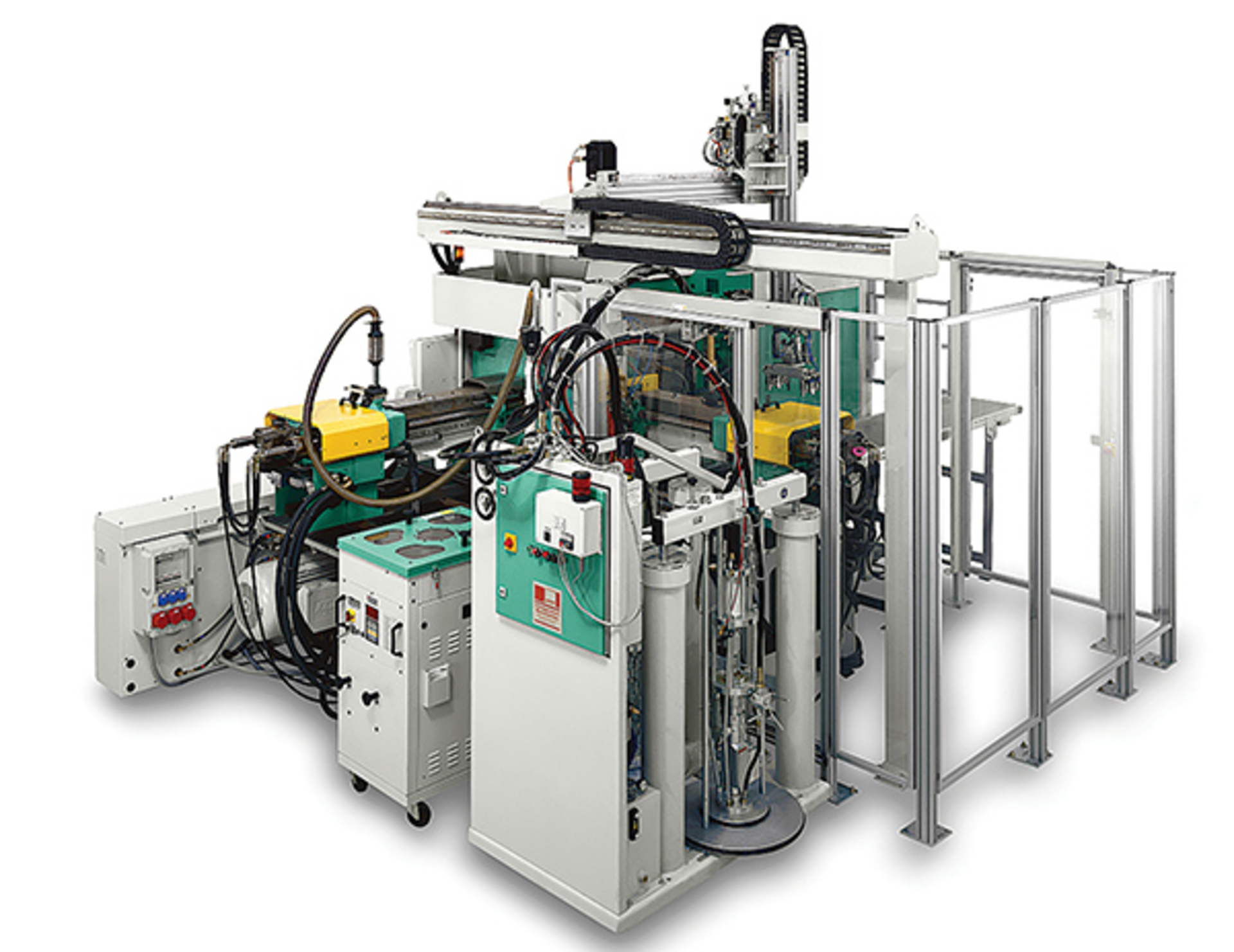A multicomponent machine with integrated robot, LSR pump delivery system and a dryer for the thermoplastic substrate.