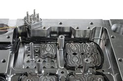 In Ewikon's 192-cavitiy tool, each micro-manifold acts as a single zone of temperature control to balance melt flow.. In Ewikon's 192-cavitiy tool, each micro-manifold acts as a single zone of temperature control to balance melt flow..