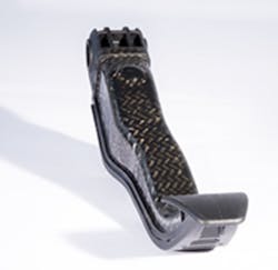 This automotive brake pedal, manufactured by ZF Friedrichshafen, is the first hybrid concept using Engel's organomelt process. This automotive brake pedal, manufactured by ZF Friedrichshafen, is the first hybrid concept using Engel's organomelt process.