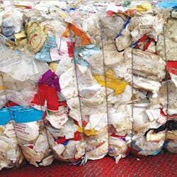 A bale of PS and EPS before it is compacted. A bale of PS and EPS before it is compacted.