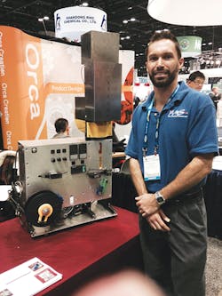B3D's Brandon Bell with the iExtruder benchtop extruder B3D's Brandon Bell with the iExtruder benchtop extruder