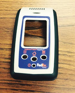 A molded panel for a FedEx barcode scanner. A molded panel for a FedEx barcode scanner.