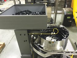 In D&M's factory, an automated optical sorting machine helps identify defective parts. In D&M's factory, an automated optical sorting machine helps identify defective parts.
