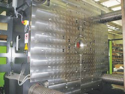 Tecnomagnete's PressTec Grip system utilizes mold plates that are just 37mm thick. Tecnomagnete's PressTec Grip system utilizes mold plates that are just 37mm thick.