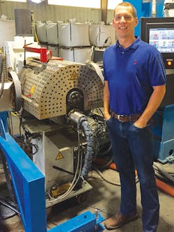 Bryan Adams of Somerset Recycling Services Inc. with an Ettlinger ERF system Bryan Adams of Somerset Recycling Services Inc. with an Ettlinger ERF system