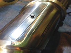 A range of scrap materials can be processed on a single screw if it is outfitted with a specially designed stainless steel barrier or dam. Designed by R. Dray Manufacturing, the dam can be raised or lowered to improve processing. A range of scrap materials can be processed on a single screw if it is outfitted with a specially designed stainless steel barrier or dam. Designed by R. Dray Manufacturing, the dam can be raised or lowered to improve processing.