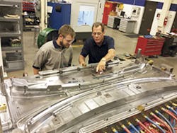 FAMILY BUSINESS: Roger Klouda, right, and his son Kyle review changes to an existing mold at MSI's South Carolina facility. FAMILY BUSINESS: Roger Klouda, right, and his son Kyle review changes to an existing mold at MSI's South Carolina facility.