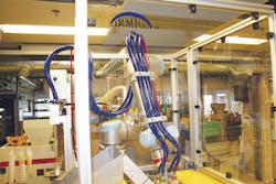 Parts for modern hearing aids are often only a millimeter in size. Oticon turned to a UR5 six-axis robot to suction the small parts out of a mold. Parts for modern hearing aids are often only a millimeter in size. Oticon turned to a UR5 six-axis robot to suction the small parts out of a mold.