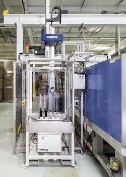 One of Vision's first automation cells used a Sepro S5-25 three-axis beam robot to remove lens frames from the mold. One of Vision's first automation cells used a Sepro S5-25 three-axis beam robot to remove lens frames from the mold.