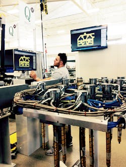 An operator compares the results of a laser scan to the mold dimensions supplied by a customer to insure that the system meets specs. An operator compares the results of a laser scan to the mold dimensions supplied by a customer to insure that the system meets specs.