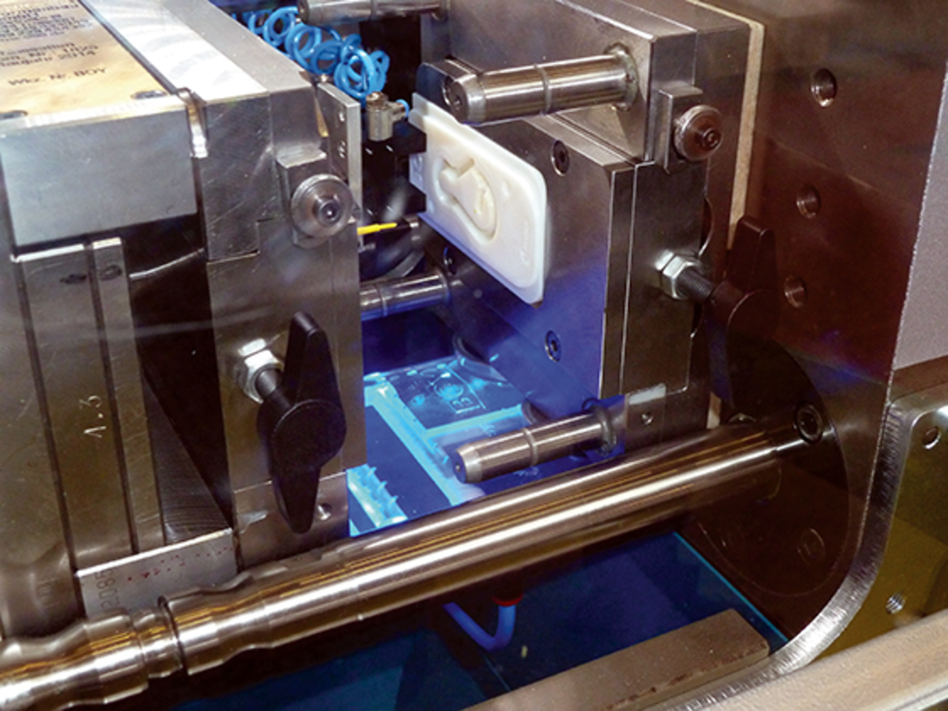 A Boy XS press molds parts using a 3-D printed mold insert that was made in the company's booth during Fakuma.