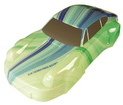 An Illig thermoforming machine created this custom-designed shell of a replica sports car. An Illig thermoforming machine created this custom-designed shell of a replica sports car.