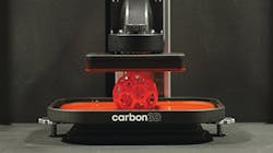 The M1 3-D printer at work The M1 3-D printer at work