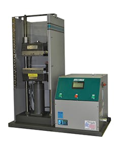 A Wabash/Carver compression molding system A Wabash/Carver compression molding system