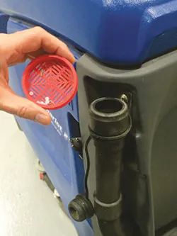 A filter produced on a 3-D MakerBot printer captures resin from a floor sweeper. A filter produced on a 3-D MakerBot printer captures resin from a floor sweeper.