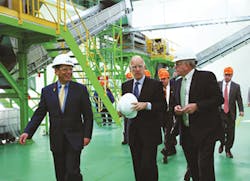 Farahnik, left, with California Gov. Jerry Brown, center, during a 2012 plant tour of CarbonLite. Farahnik, left, with California Gov. Jerry Brown, center, during a 2012 plant tour of CarbonLite.