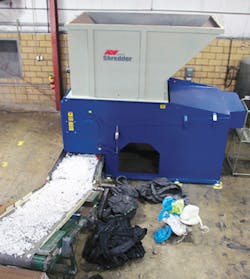 Avian's ASG1500 customized shredder at work. Avian's ASG1500 customized shredder at work.