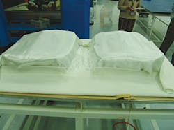 To protect the tooling from severe loading conditions, tools are vacuum bagged in a plate. To protect the tooling from severe loading conditions, tools are vacuum bagged in a plate.