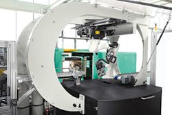 An Agilus six-axis robot supplied by Kuka on an Arburg press An Agilus six-axis robot supplied by Kuka on an Arburg press