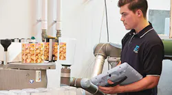 A collaborative UR5 robot from Universal Robots can work with a human without any safety guarding.