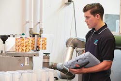 A collaborative UR5 robot from Universal Robots can work with a human without any safety guarding. A collaborative UR5 robot from Universal Robots can work with a human without any safety guarding.