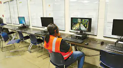 An IAC employee in training