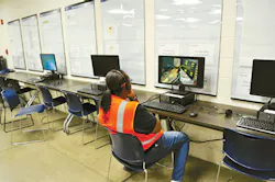 An IAC employee in training