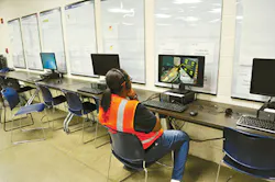 An IAC employee in training