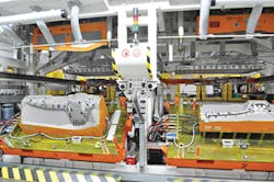 IAC's Anniston plant has a dual-platen vacuum forming line./Michelle Parr Paulson photo IAC's Anniston plant has a dual-platen vacuum forming line./Michelle Parr Paulson photo