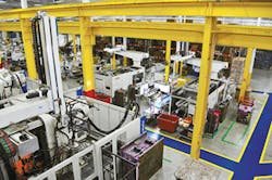 IAC’s Anniston plant has 36 injection molding machines/Michelle Par Paulson photo IAC’s Anniston plant has 36 injection molding machines/Michelle Par Paulson photo