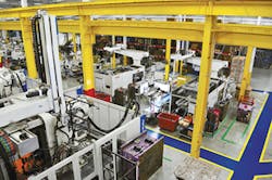 IAC’s Anniston plant has 36 injection molding machines/Michelle Par Paulson photo IAC’s Anniston plant has 36 injection molding machines/Michelle Par Paulson photo