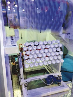 Polytype OMV's RM77 Revolver in action during the K show, where the new thermoforming machine used its 51-cavity revolving mold to produce PP cups. The machine's patented rotating mold system is designed to compete against tilting technology. Polytype OMV's RM77 Revolver in action during the K show, where the new thermoforming machine used its 51-cavity revolving mold to produce PP cups. The machine's patented rotating mold system is designed to compete against tilting technology.