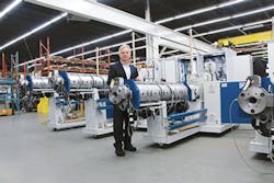 Brampton Engineering CEO Gary Hughes with one of the firm&apos;s multilayer film lines