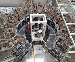 The extrusion section of the 13-layer, triple-bubble extrusion line from Kuhne. The extrusion section of the 13-layer, triple-bubble extrusion line from Kuhne.