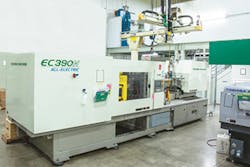 An all-electric, 390-ton horizontal press from Toshiba is the largest injection molding machine used by Dynamic. An all-electric, 390-ton horizontal press from Toshiba is the largest injection molding machine used by Dynamic.
