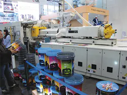 At the K show, L.K. Machinery produced 20-liter pails, molded with both inside and outside labels./PMM At the K show, L.K. Machinery produced 20-liter pails, molded with both inside and outside labels./PMM