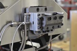 Entek's QC3 strand die is designed for simplified cleaning and maintenance. Entek's QC3 strand die is designed for simplified cleaning and maintenance.