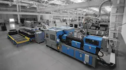 Athena Automation welcomes visitors to see its lights-out work cell.