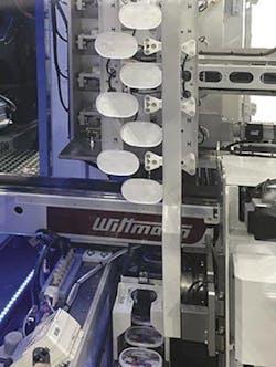 The W837 IML system from Wittmann Battenfeld The W837 IML system from Wittmann Battenfeld