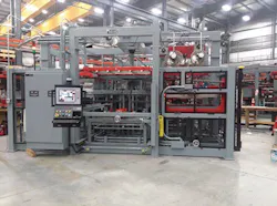 Maac's Model 44R4D, a four-station double oven with an automatic sheet-loading and part-unloading system. Maac's Model 44R4D, a four-station double oven with an automatic sheet-loading and part-unloading system.