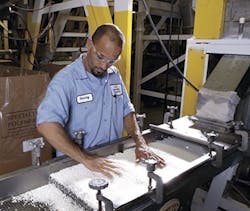 Pelletized compounds pass through a vibration feeder. Pelletized compounds pass through a vibration feeder.