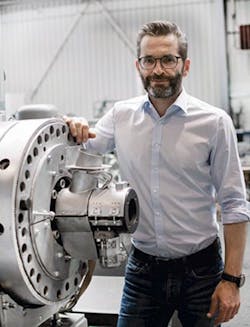 Robert Obermayr, an Erema employee, stands with a Laserfilter. Robert Obermayr, an Erema employee, stands with a Laserfilter.