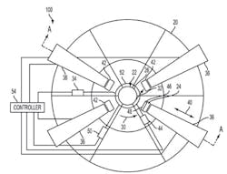 A 3-D printer, seen from the side, features a rotating core and multiple print heads. A 3-D printer, seen from the side, features a rotating core and multiple print heads.