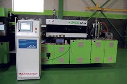 An A5-N-series machine with 720 tons of clamping force, equipped with a Linde CO2 gas-assist system An A5-N-series machine with 720 tons of clamping force, equipped with a Linde CO2 gas-assist system