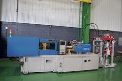 An HST2 65-ton machine with an Elmet elastomer dosing system An HST2 65-ton machine with an Elmet elastomer dosing system