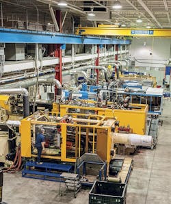 StackTeck's TeckCenter includes a Husky HyPac press with 550 tons of clamping force. StackTeck's TeckCenter includes a Husky HyPac press with 550 tons of clamping force.
