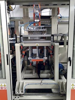 An ER2X robot installed on an ACF 820 machine An ER2X robot installed on an ACF 820 machine