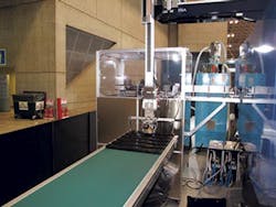 The J280ADS-890H-CFRTP/UD-Tape injection molding cell from JSW The J280ADS-890H-CFRTP/UD-Tape injection molding cell from JSW