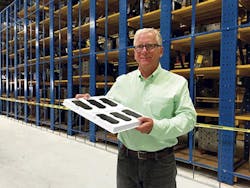 Sholtis displays a tray of custom injection molded components PMT manufactures for an automotive industry customer. Sholtis displays a tray of custom injection molded components PMT manufactures for an automotive industry customer.