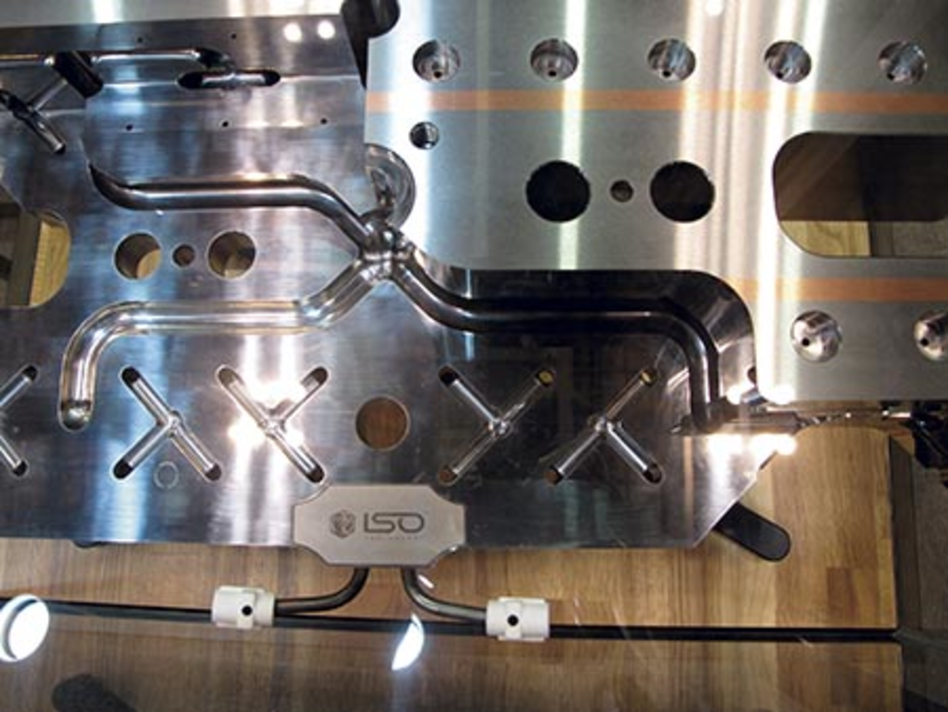 Yudo's hot-runner manifold technology creates melt channels that perform better than conventional gun-drilled channels.